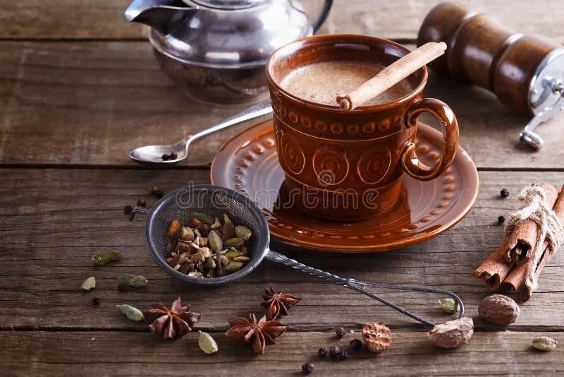 A rustic cup of chai with spices