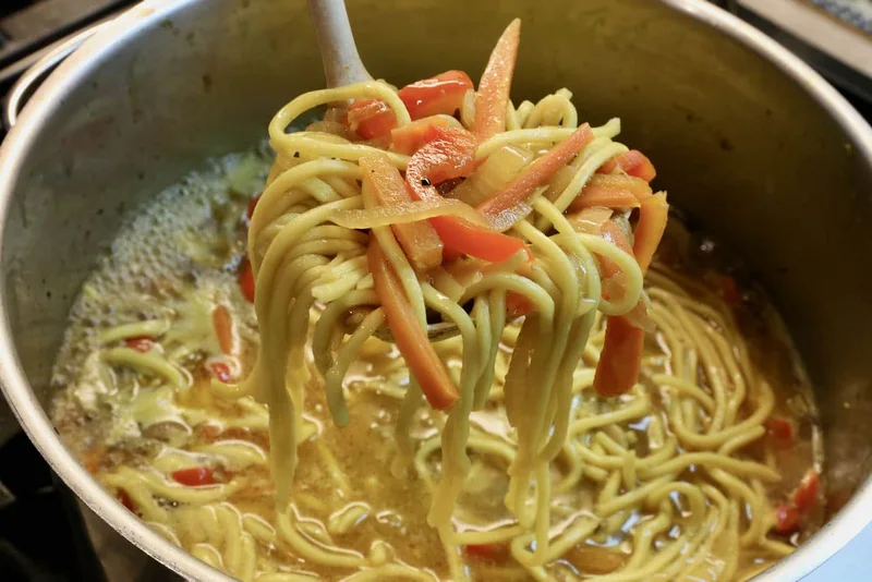 Bowl of thukpa noodle soup with chopsticks